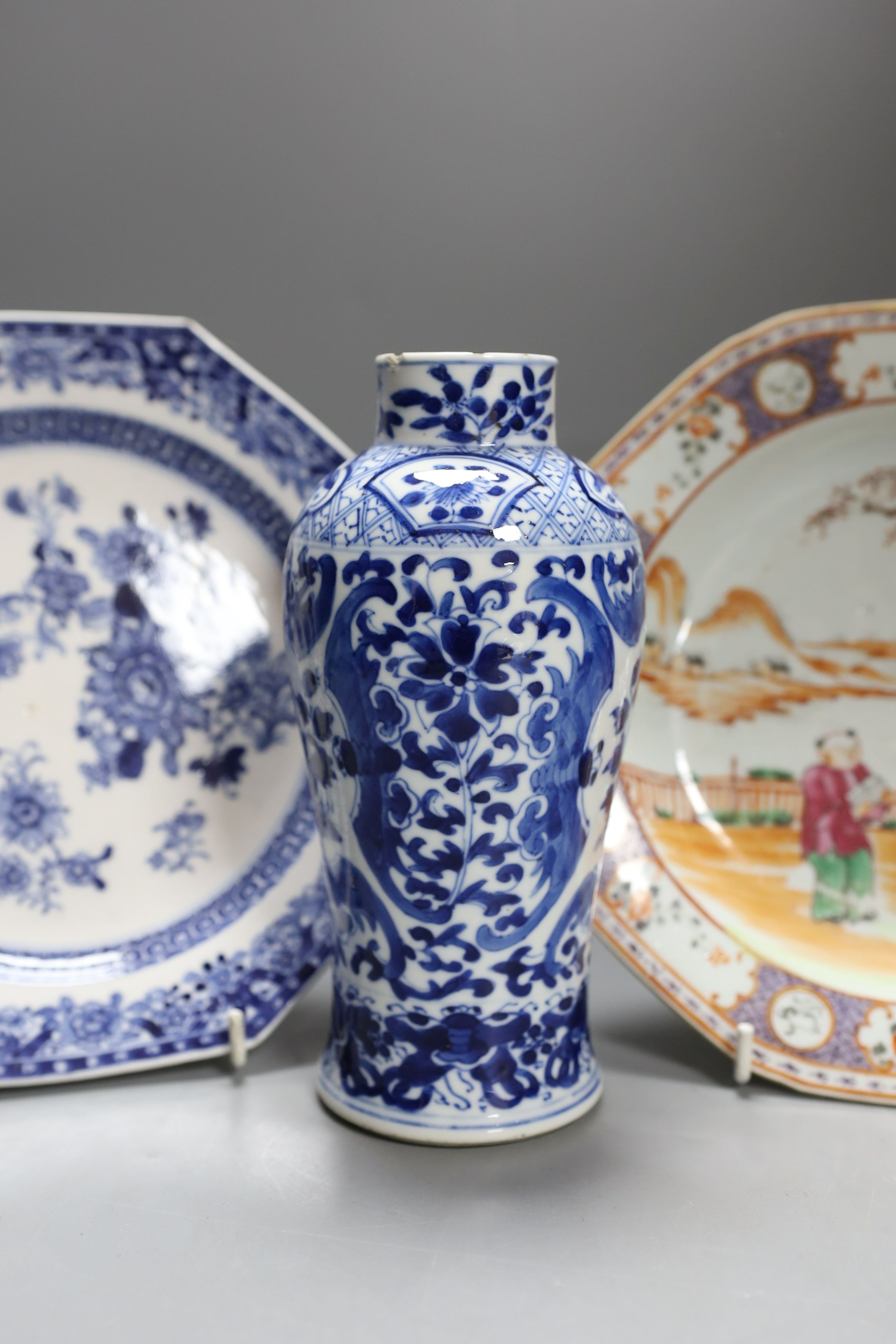 An 18th century Chinese export blue and white plate and dish, a blue and white vase and a famille rose plate